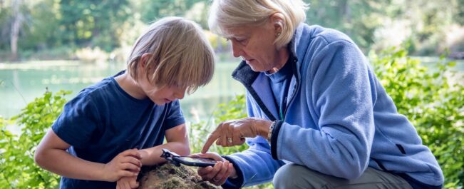 Science Connect Banner, Grandma with grandson using Citizen Science Tools