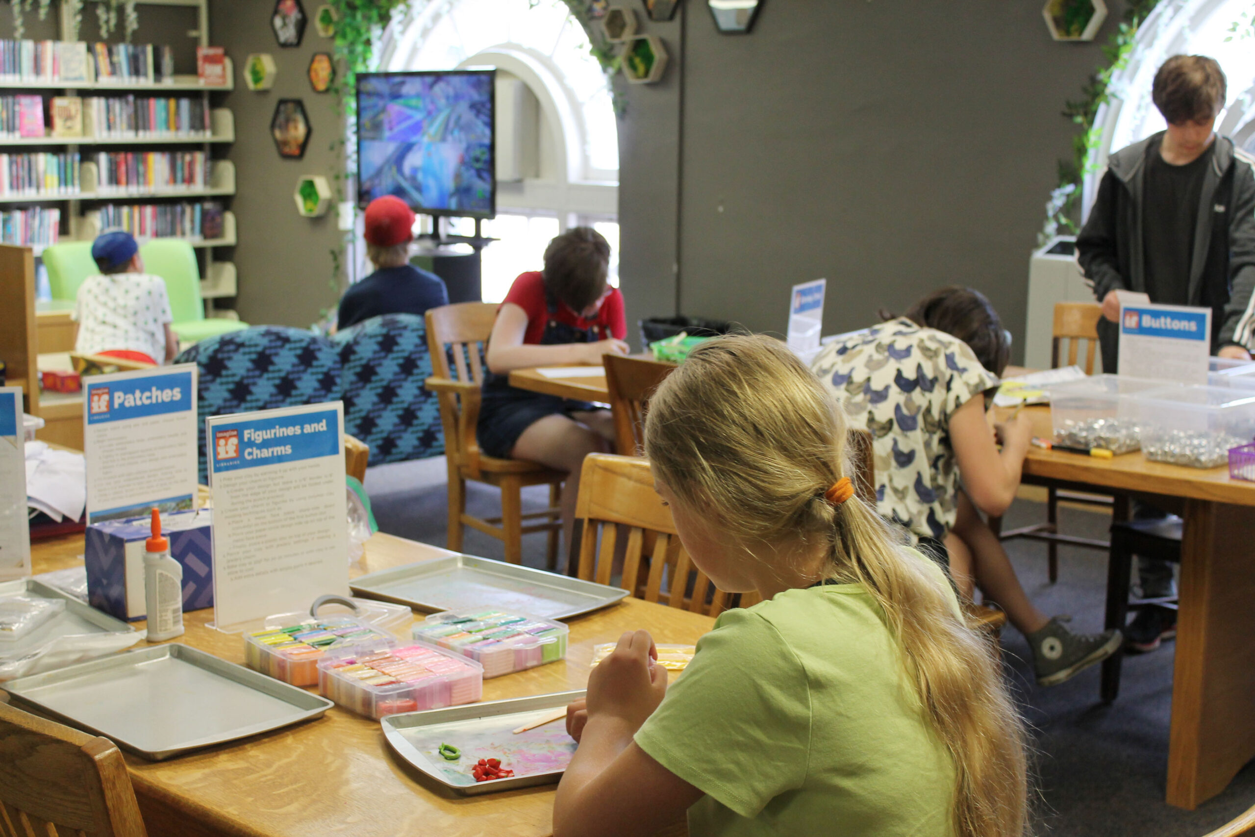 Teens doing activity at library